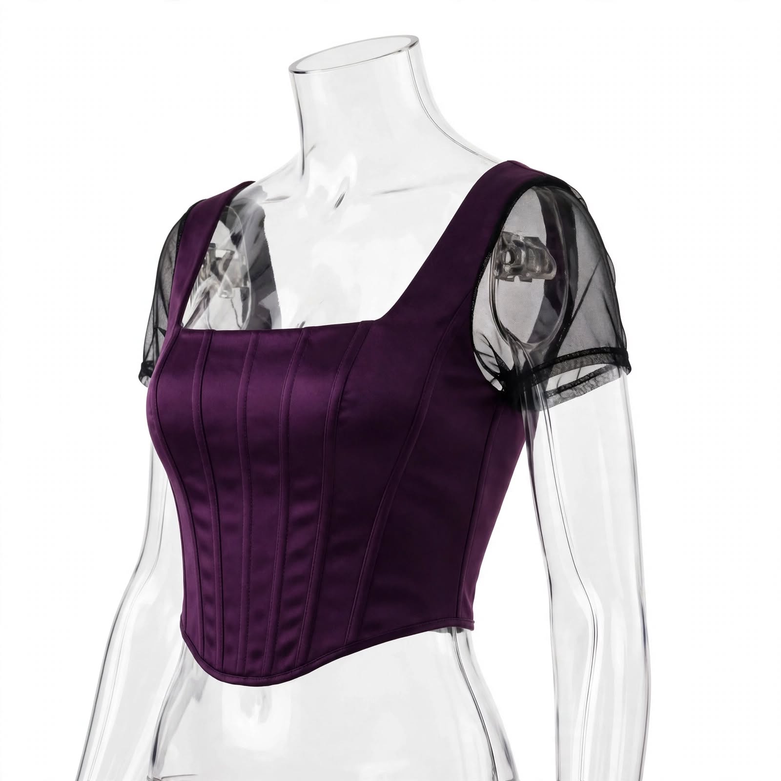 A dark purple satin corset-style top with sheer black mesh cap sleeves, displayed on a clear mannequin torso against a white background.